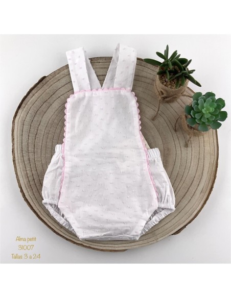 Ranita de de niña de plumeti blanca y rosa.