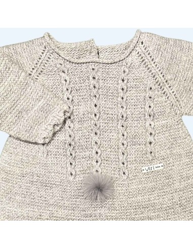 Pelele de bebe de lana con pompón.
