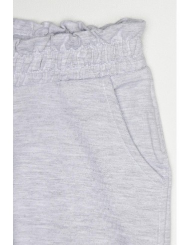 Pantalón tipo chándal niña engomado y bolsillos
