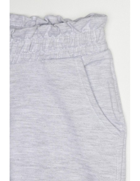 Pantalón tipo chándal niña engomado y bolsillos
